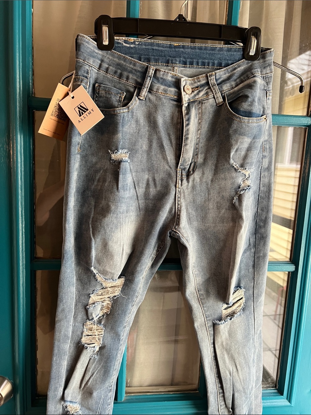 Women’s Distressed Light Blue Jeans